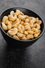 Cashew nuts superfood natural food dish organic fresh tasty gourmet food background on the table rustic food top view copy space