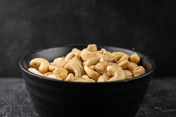 Cashew nuts superfood natural food dish organic fresh tasty gourmet food background on the table rustic food top view copy space