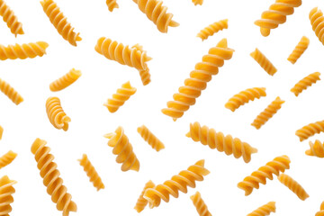 A vibrant assortment of spiral pasta pieces floating against a black background, showcasing their unique shapes and textures.
