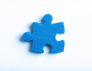 Fototapeta premium Blue puzzle piece isolated on white background. Minimalist design.