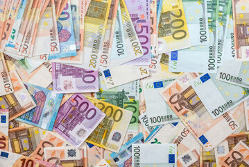 Lot of paper euro cash as finance background, top view