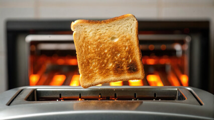 slice of golden toast pops up from toaster, showcasing crispy texture and warm appearance, evoking sense of comfort