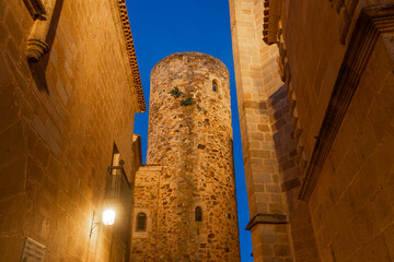 Carvajal tower of the medieval city of Caceres (UNESCO world Heritage Site), Spain, at night.