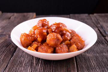 Baked Sweet and Sour Meatballs. Pineapple. Chopsticks