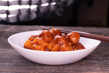 Baked Sweet and Sour Meatballs. Pineapple. Chopsticks