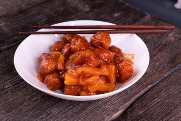 Baked Sweet and Sour Meatballs. Pineapple. Chopsticks