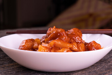 Baked Sweet and Sour Meatballs. Pineapple. Chopsticks