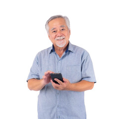 Smiling Asian senior man using smartphone, standing and touching screen casually in casual shirt, showing technology adoption, communication, digital lifestyle, isolated on a transparent background