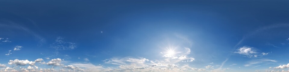 Seamless cloudy blue sky hdri panorama 360 degrees angle view with zenith and beautiful clouds for use in 3d graphics or game development as sky dome or edit drone shot