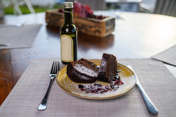 A Gugelhupf (Kuglof) is a cake traditionally baked in a distinctive ring pan, similar to Bundt...