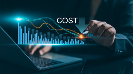 Cost reduction business finance concept, Budget management and cost management, Businessman analyzes financial graphs to reduce business costs, Optimization, Strategy, Economic cost savings.