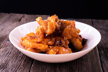 Sweet and sour chicken. Fried meat. Food concept. Chopsticks