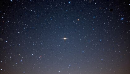 A sea of gray stars in the night sky, with one bright star shining prominently.