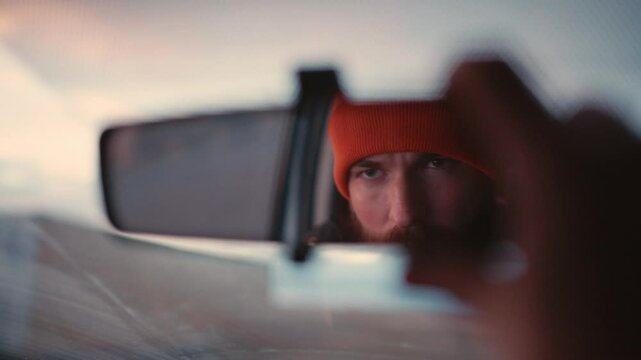 Man Preparing for a Drive in Iceland
