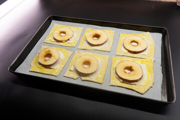Puff pastry with apple and cream cheese. Dessert. Pastry. Bread