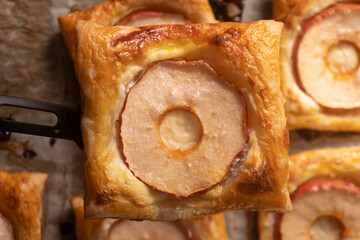 Puff pastry with apple and cream cheese. Dessert. Pastry. Bread