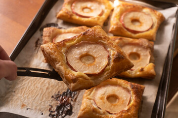 Puff pastry with apple and cream cheese. Dessert. Pastry. Bread