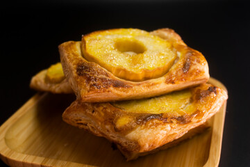 Puff pastry with apple and cream cheese. Dessert. Pastry. Bread