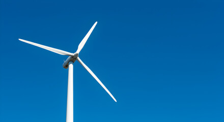 Fototapeta premium Wind Turbine Against Blue Sky Generating Renewable Energy for Sustainability