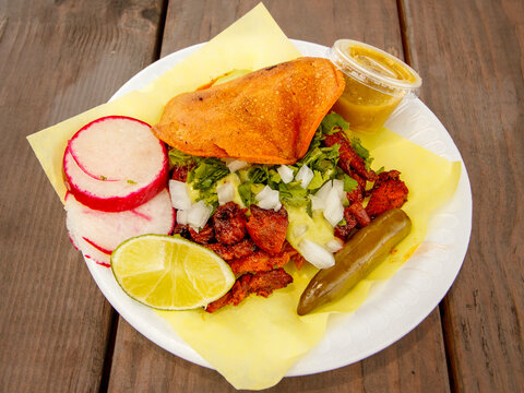A funky street snack in Sinaloa called a vampiro. Imagine a corn-tortilla taco that's cooked on a grill until it turns crackly and crunchy.