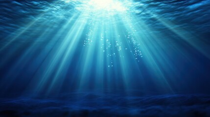Sunlight filtering through the ocean surface illuminating underwater scene with bubbles