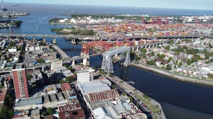Buenos aires cityscape showing riachuelo river, nicolas avellaneda bridge and port