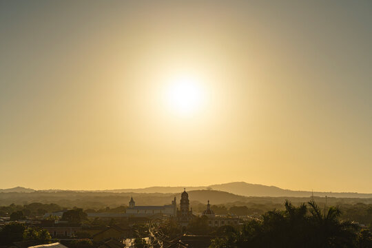 Granada, Nicaragua, colonial, architecture, sunset, dome, cityscape, rooftop, church, Latin America, historic, travel, tourism, religious, statue, scenic, skyline, old town, building, culture, panoram - Powered by Adobe