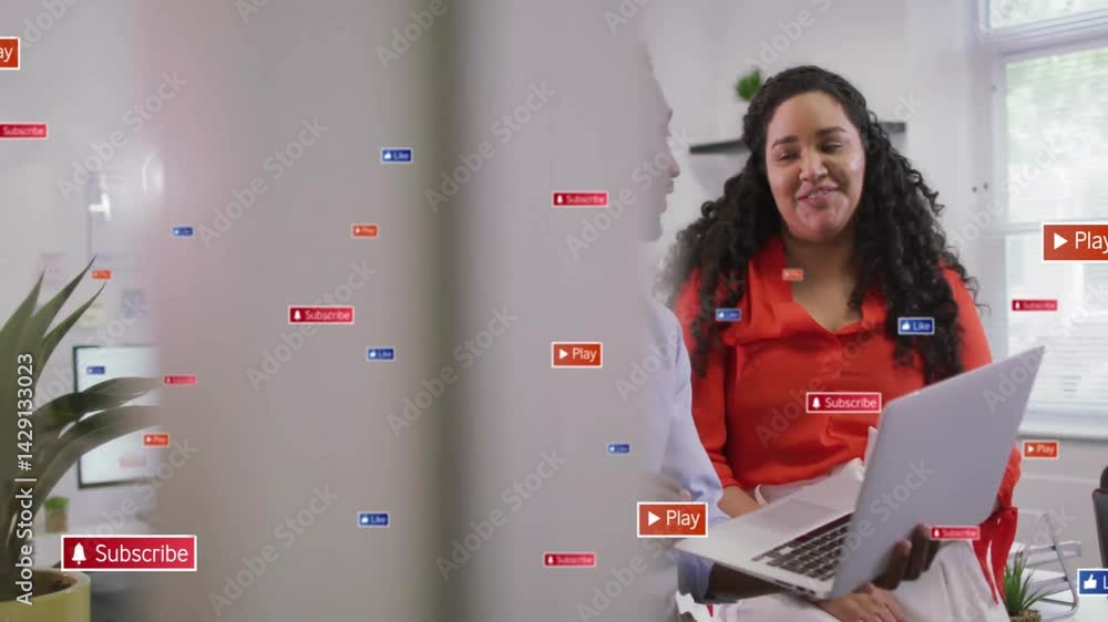 Poster two coworkers using laptop in tech office showing floating subscribe like play icons