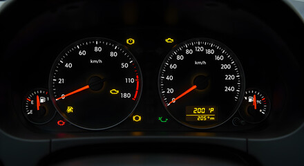 Close Up Car Dashboard Displaying Speedometer Tachometer and Control Gauges on a Vehicle Panel