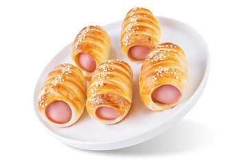 Sausage in dough, hot dog bread mini in a plate on a white isolated background