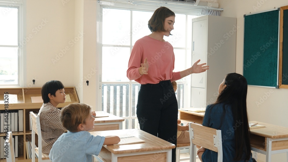 Poster caucasian teacher walking and check student homework at classroom while diverse children doing class