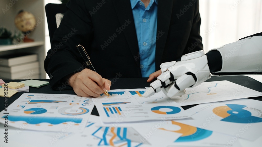 Poster a business professional actively collaborates with a robotic arm on data analysis in a modern office