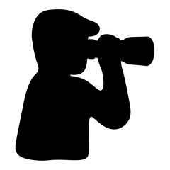 A silhouette of a man looking through binoculars with a casual cap