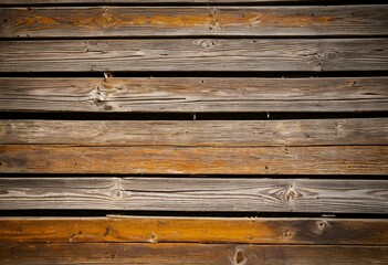 Naklejka premium A close up of a wooden wall with peeling paint.