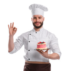 Happy confectioner in uniform holding delicious cake with berries and showing ok gesture on white background