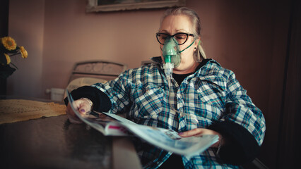 Asthma therapy – woman holding inhaler during breathing difficulty