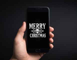 hand holding a mobile phone with merry christmas text wishes, wishing merry xmas with a message on the smartphone, texting on phone