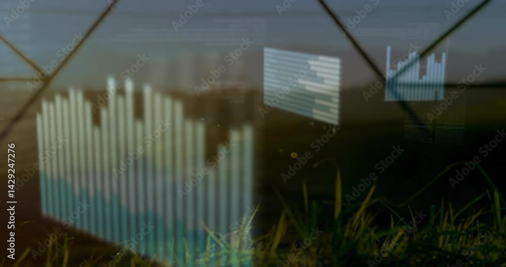 Aufkleber data overlay showing over blurred grass field through glass grid, with bar chart and histogram