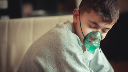 Young Boy Managing Asthma with Inhaler and Oxygen Support