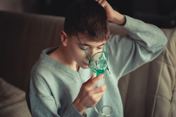 Young Boy Managing Asthma with Inhaler and Oxygen Support