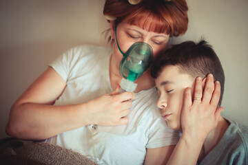 Mother and son in emotional moment during asthma therapy