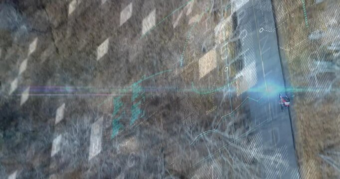 Cycling teenage male riding paved path in dry park, displaying technology world map data points - Powered by Adobe