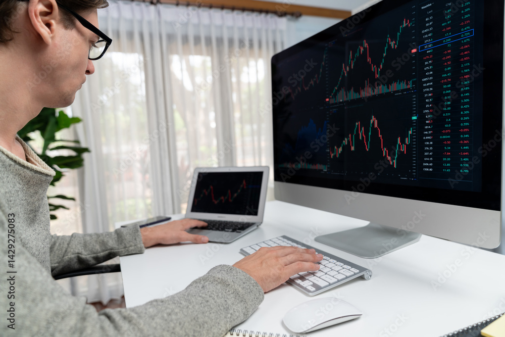 Aufkleber business trader using computer and laptop to search highest profit value of dynamic increased stock 