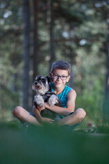 Obraz premium Kids and dogs having fun in nature