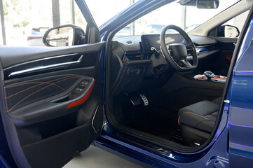 Interior of a modern car with black leather seats
