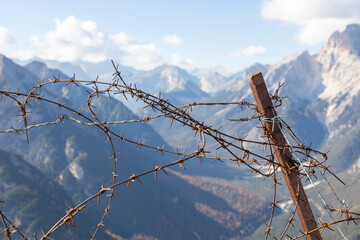 Rusty barbed wire at Monte Piana in the Dolomites, a former battlefield in World War I and a memorial and museum today