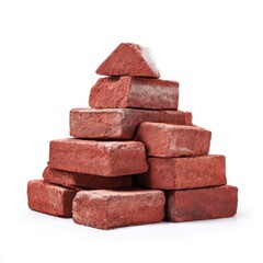 Obraz premium Textured red bricks stacked in pyramid shape isolated on white