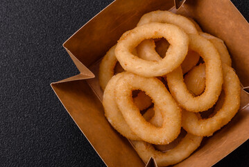 Onion rings or squid rings fries crispy, savory with sauce