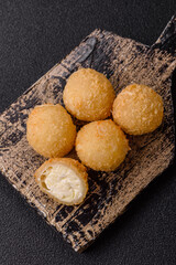 Cheese fried balls or croquettes with potatoes or rice
