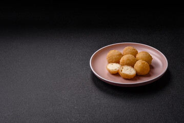 Cheese fried balls or croquettes with potatoes or rice